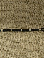 Браслет из серебра и золота c ониксом и шёлковым шнурком