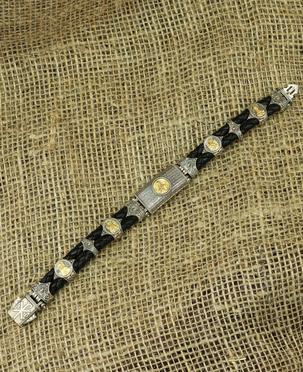 Браслет из серебра 925 пробы и золота 750 пробы c кожаным шнурком