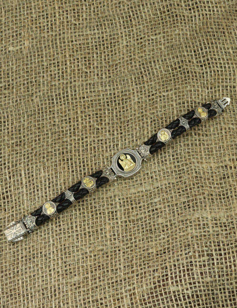 Браслет из серебра и золота c кожаным шнурком и ониксом