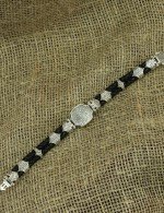 Браслет из серебра и золота c кожаным шнурком и ониксом