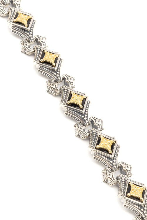 Браслет из серебра 925 пробы и золота 750 пробы c ониксом и рубином