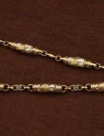 Цепь из лимонного золота c эмалью и бивнем мамонта