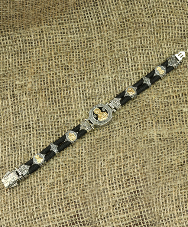 Браслет из серебра 925 пробы и золота 750 пробы c ониксом и шёлковым шнурком