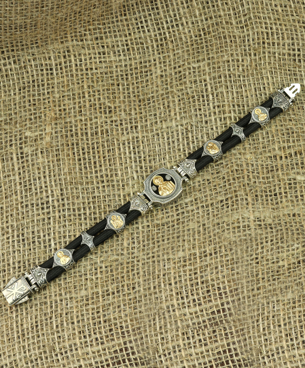 Браслет из серебра 925 пробы и золота 750 пробы c ониксом и шёлковым шнурком