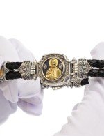 Браслет из серебра и золота c кожаным шнурком и ониксом