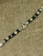 Браслет из серебра и золота c ониксом и шёлковым шнурком