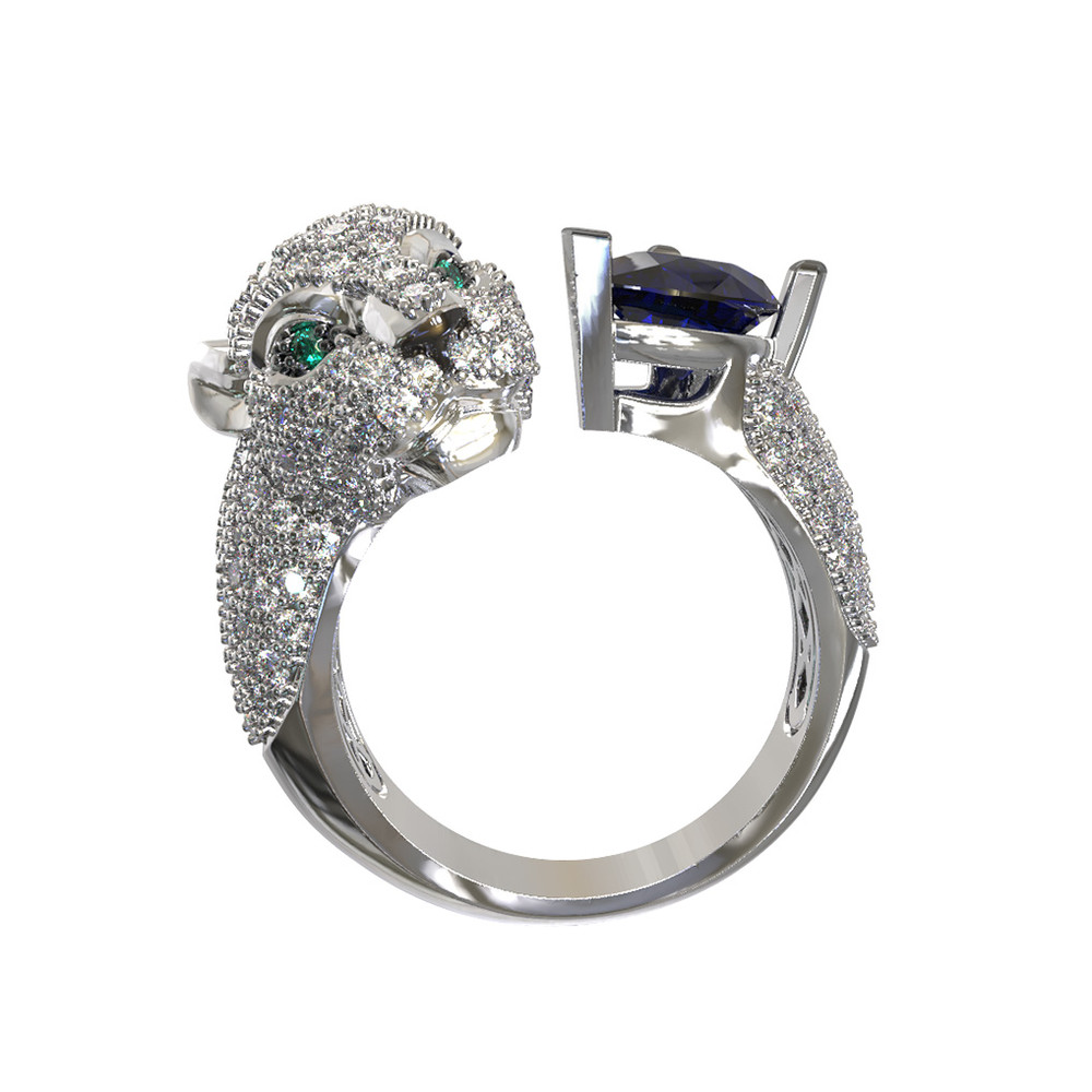 Кольцо из белого золота 585 пробы c бриллиантами, сапфиром и изумрудом