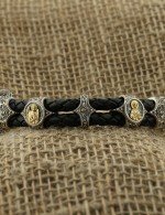 Браслет из серебра и золота c кожаным шнурком и ониксом