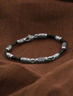 Браслет из белого золота c кожаным шнурком