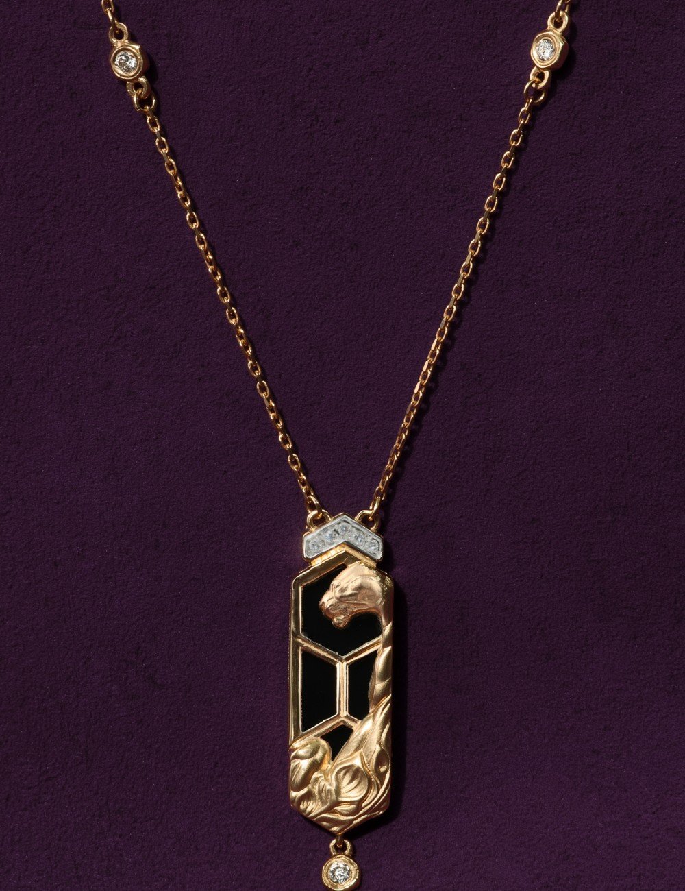 Колье из золота c бриллиантами и ониксом