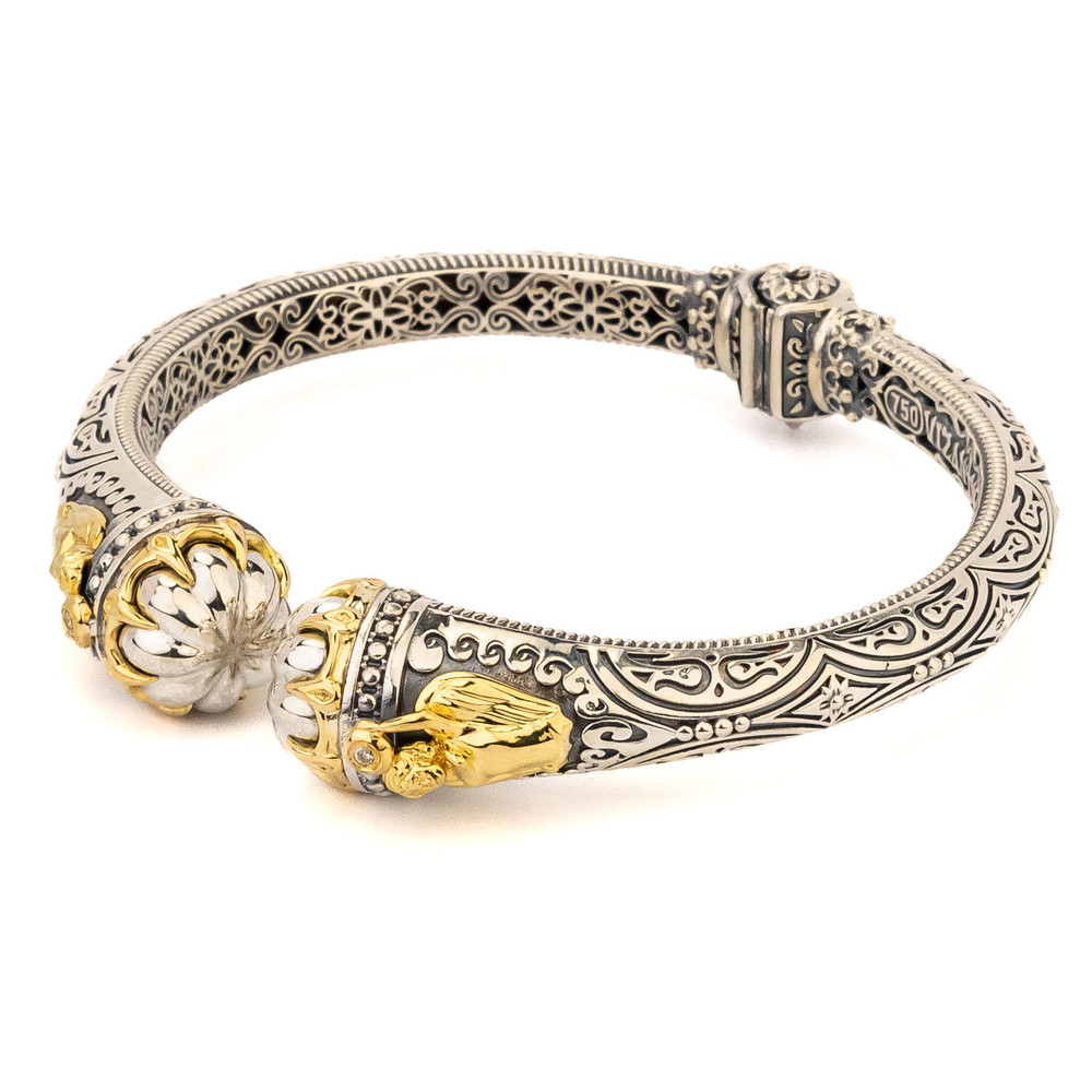 Браслет из серебра 925 пробы и золота 750 пробы c бриллиантами и рубином