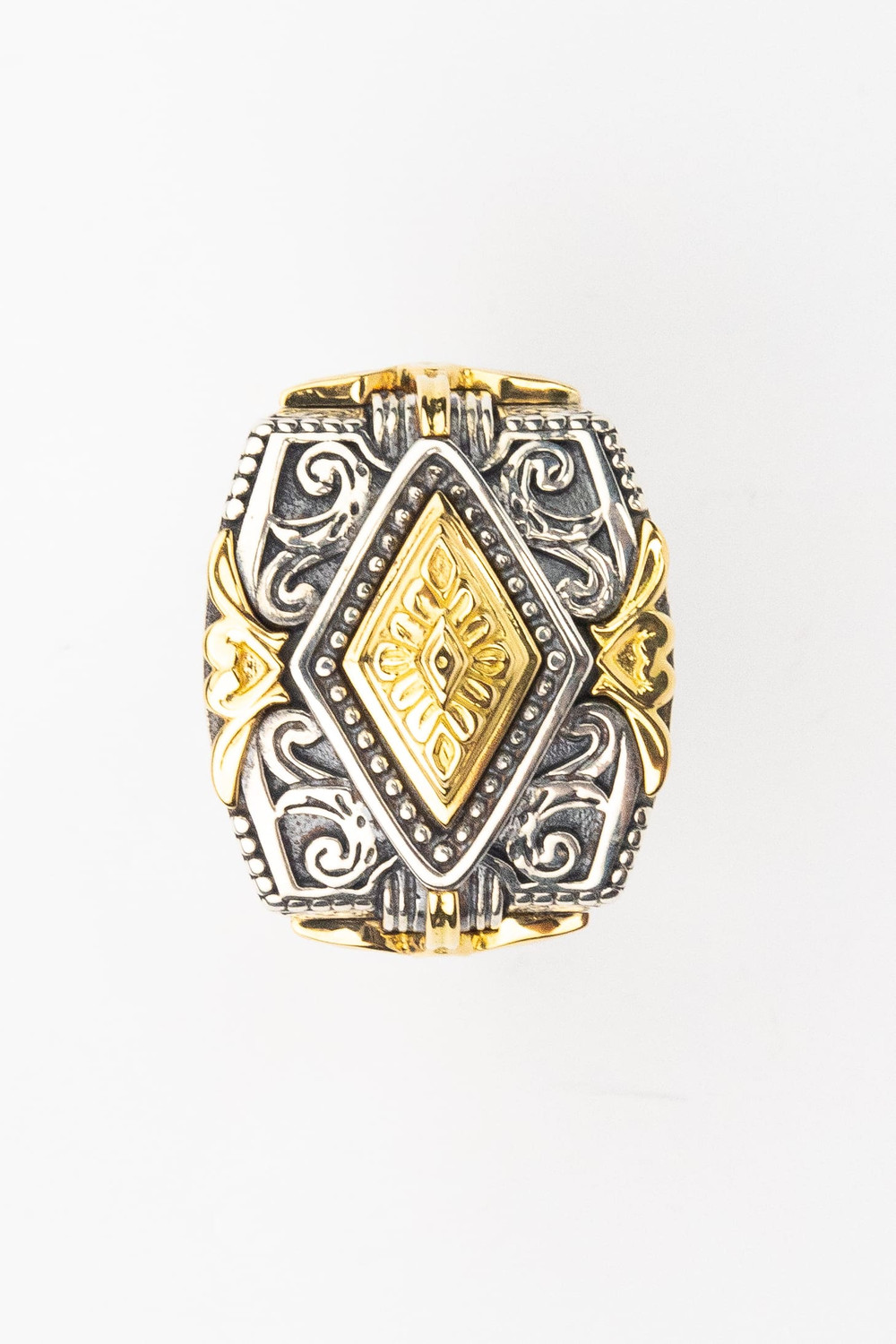 Кольцо из серебра 925 пробы и золота 750 пробы c рубином