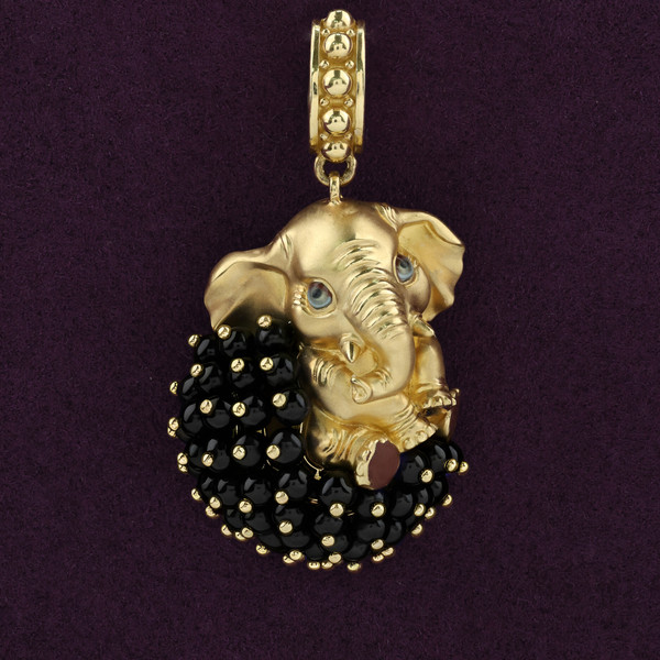 Подвеска из лимонного золота 585 пробы c эмалью и ониксом