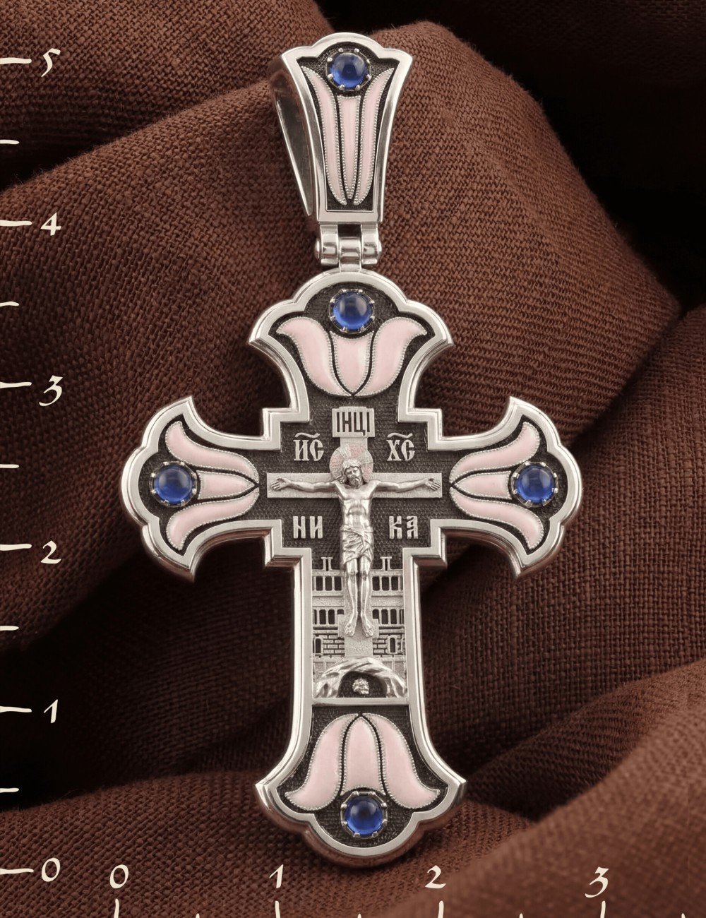 Крест из белого золота c эмалью и сапфиром