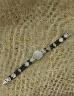 Браслет из серебра и золота c кожаным шнурком и ониксом