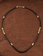 Гайтан из лимонного золота c кожаным шнурком