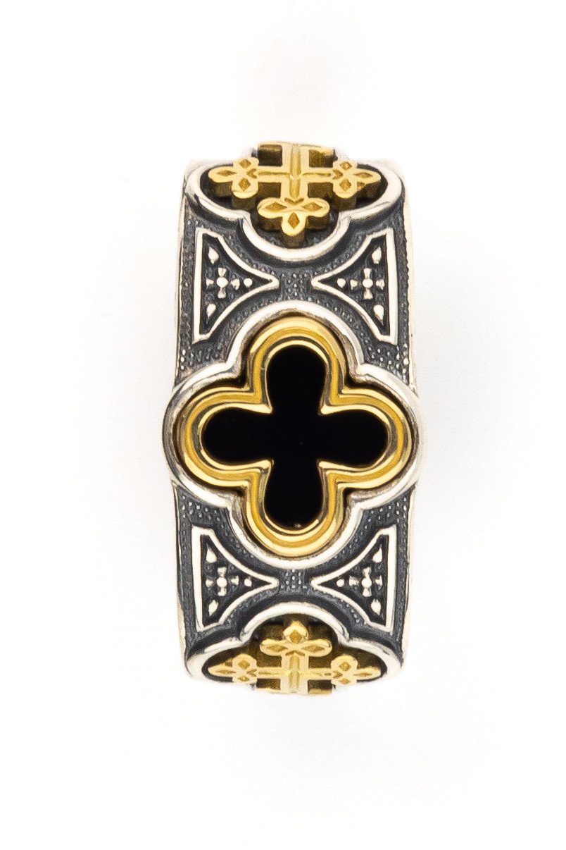 Кольцо из серебра 925 пробы и золота 750 пробы c ониксом и рубином