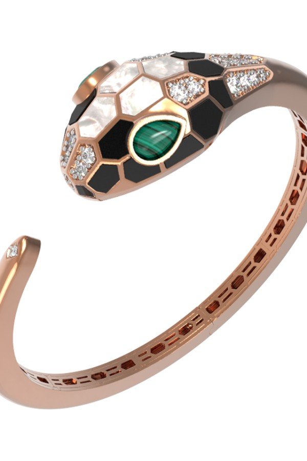 Браслет из золота c бриллиантами, рубином, ониксом, малахитом и перламутром