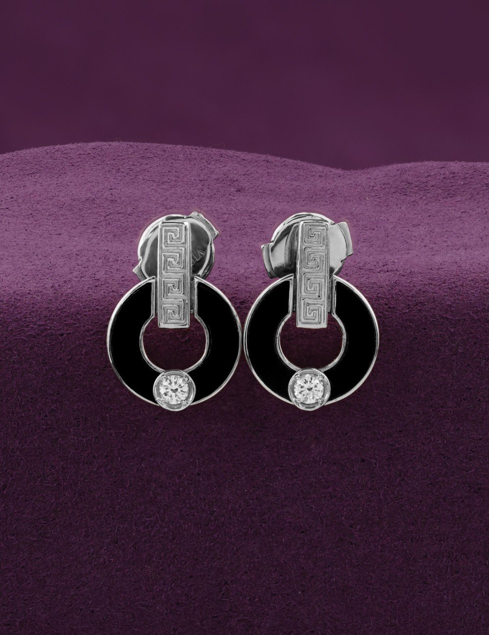 Серьги из белого золота c бриллиантами и ониксом