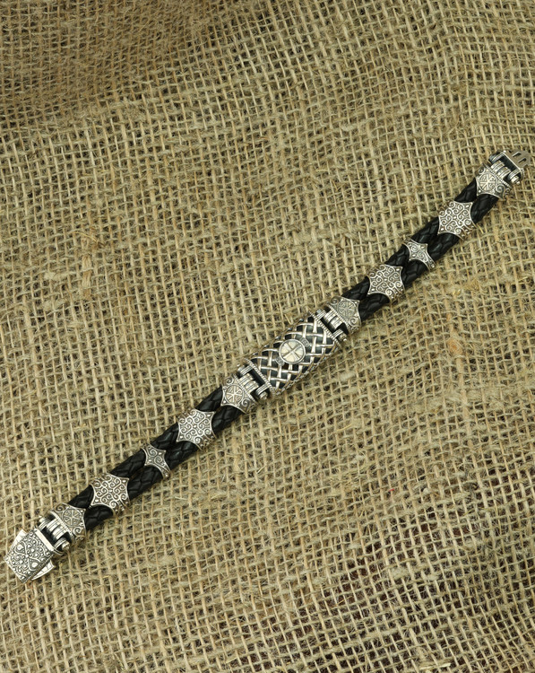 Браслет из серебра 925 пробы и золота 750 пробы c кожаным шнурком