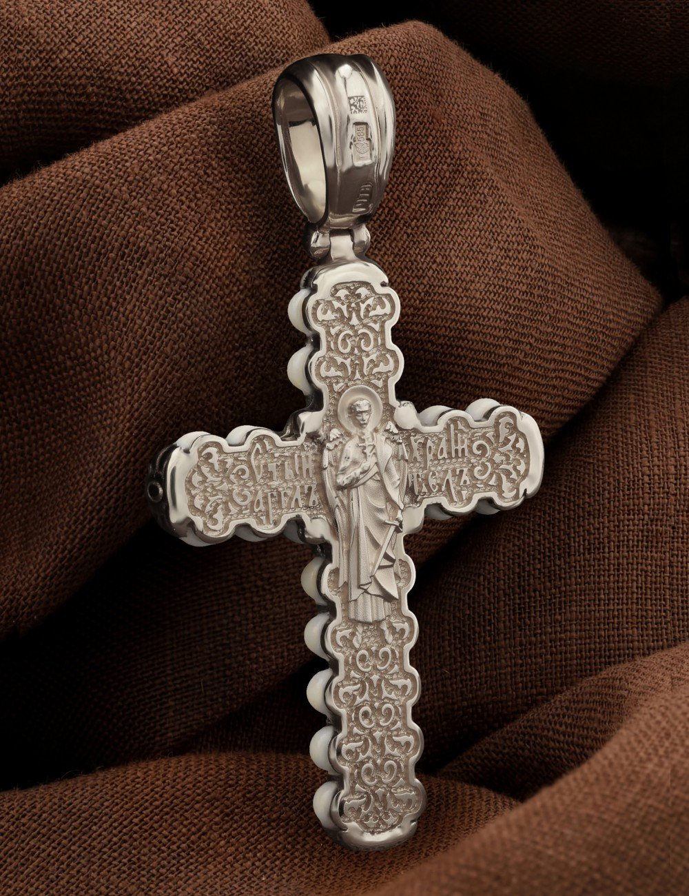 Крест из белого золота c кахолонгом