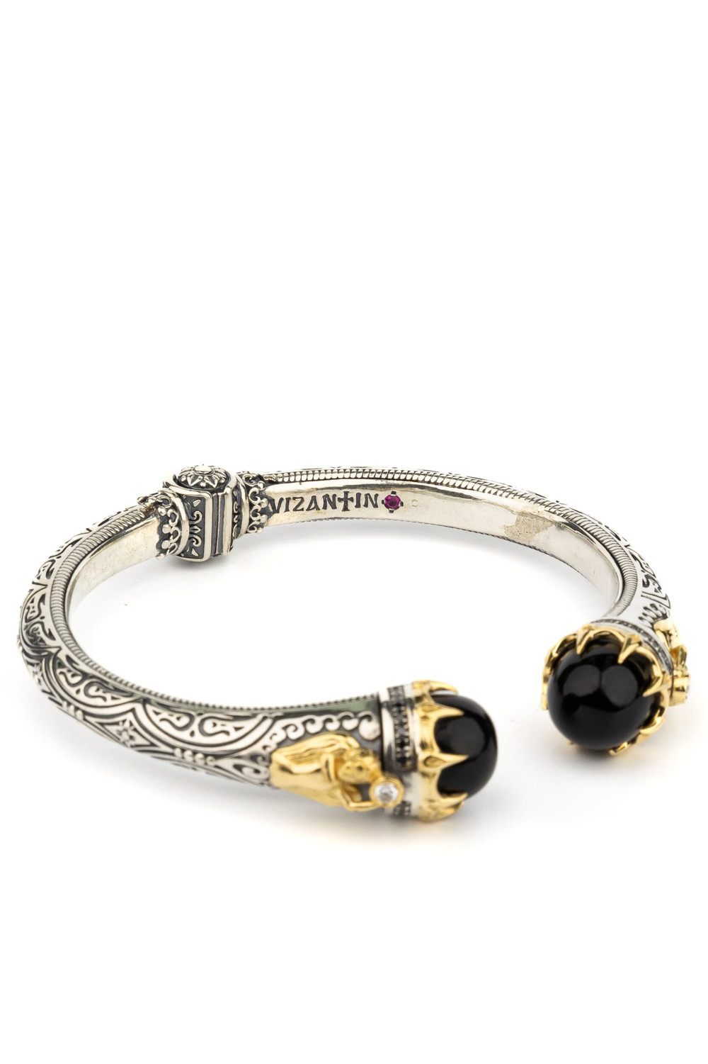 Браслет из серебра 925 пробы и золота 750 пробы c бриллиантами, ониксом и рубином