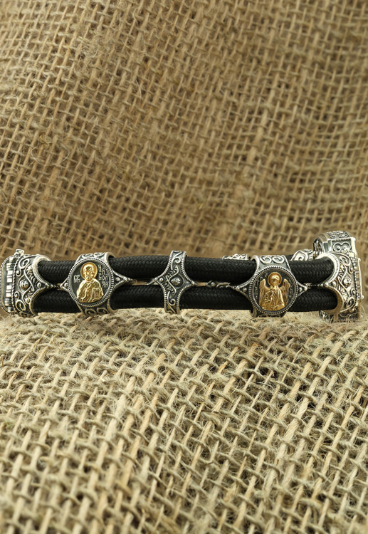 Браслет из серебра 925 пробы и золота 750 пробы c ониксом и шёлковым шнурком