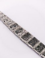 Браслет из белого золота c бриллиантами и ониксом