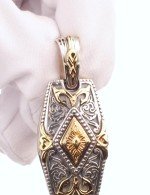 Подвеска из серебра и золота c рубином