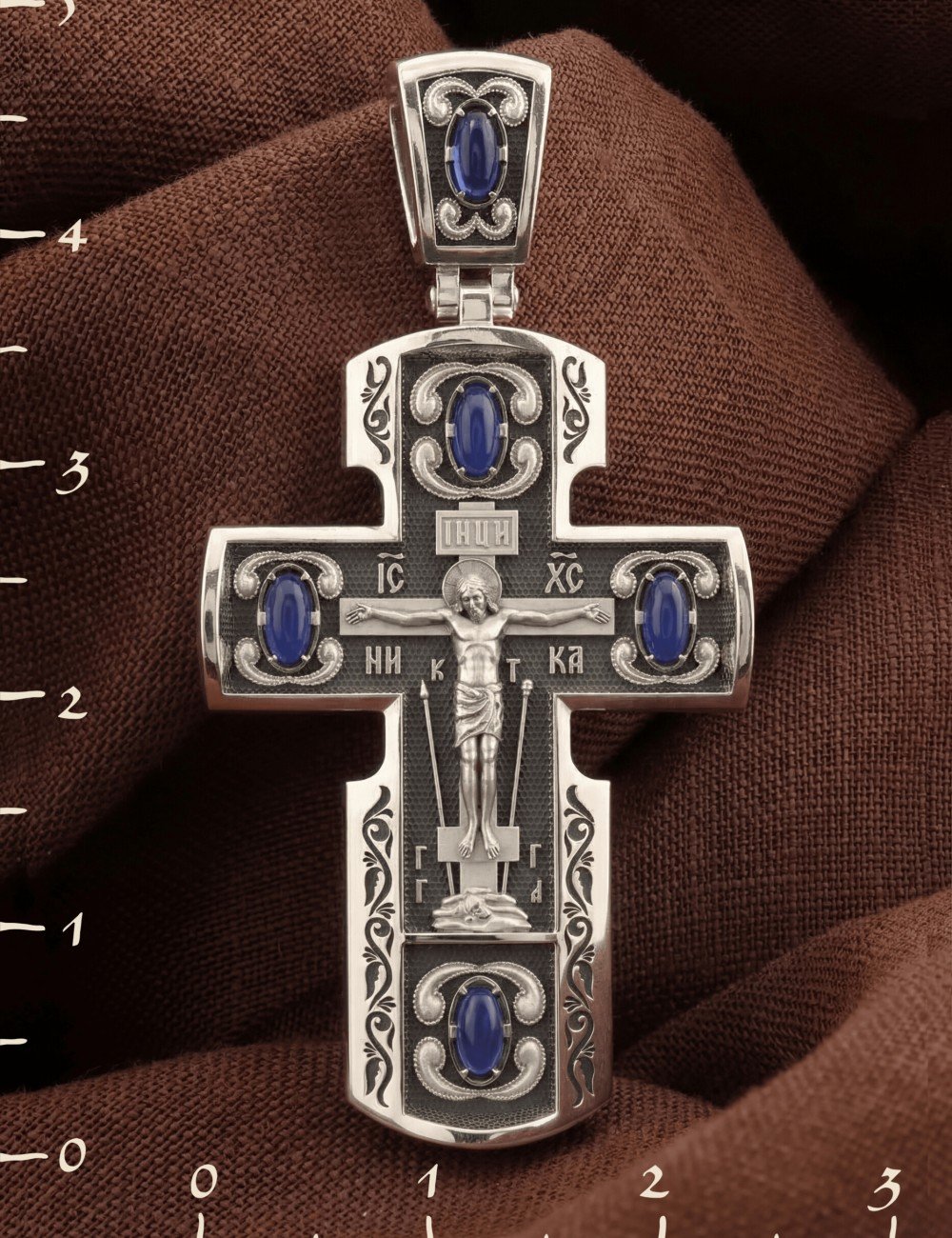 Крест из белого золота c эмалью и сапфиром