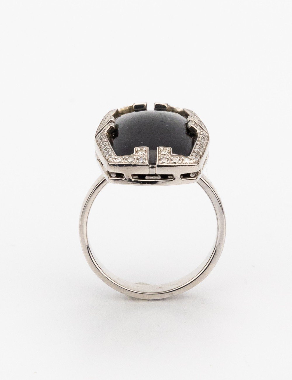 Кольцо из белого золота c бриллиантами, рубином и ониксом