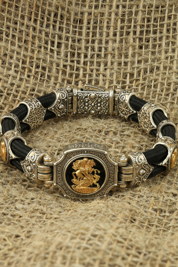 Браслет из серебра 925 пробы и золота 750 пробы c ониксом и шёлковым шнурком